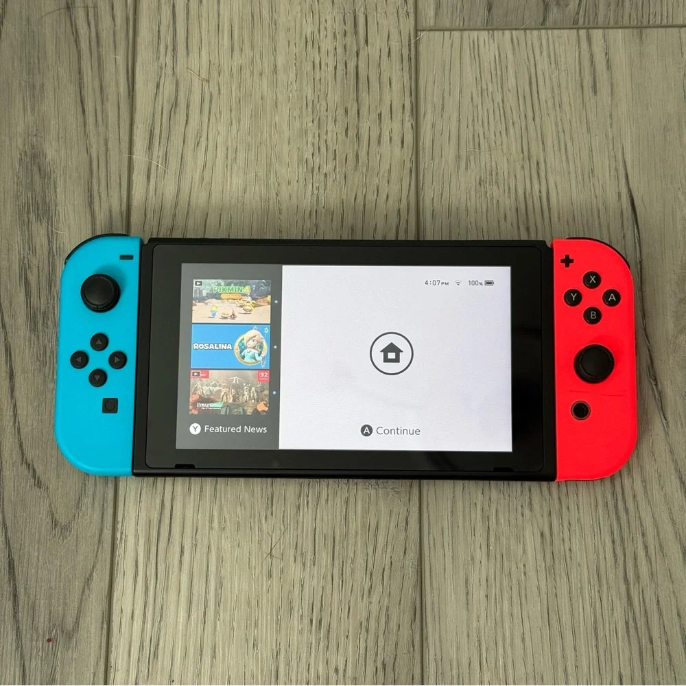 Nintendo Switch with Neon Blue and Neon Red Joy-Con